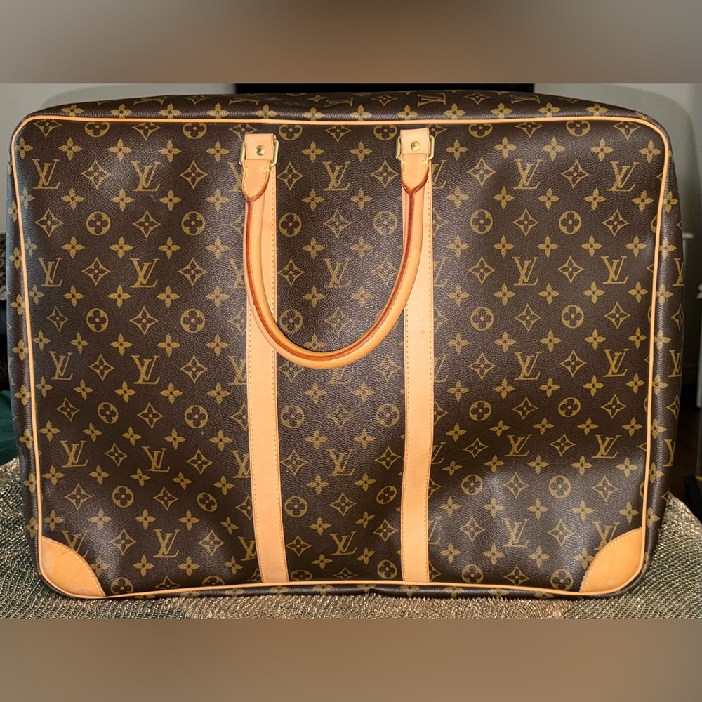 ‼️‼️SOLD‼️‼️Louis Vuitton Sirius 55
**Great condition